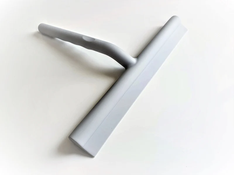 Duschabzieher Smart – Silikon mit Edelstahlkern und Wandhalterung