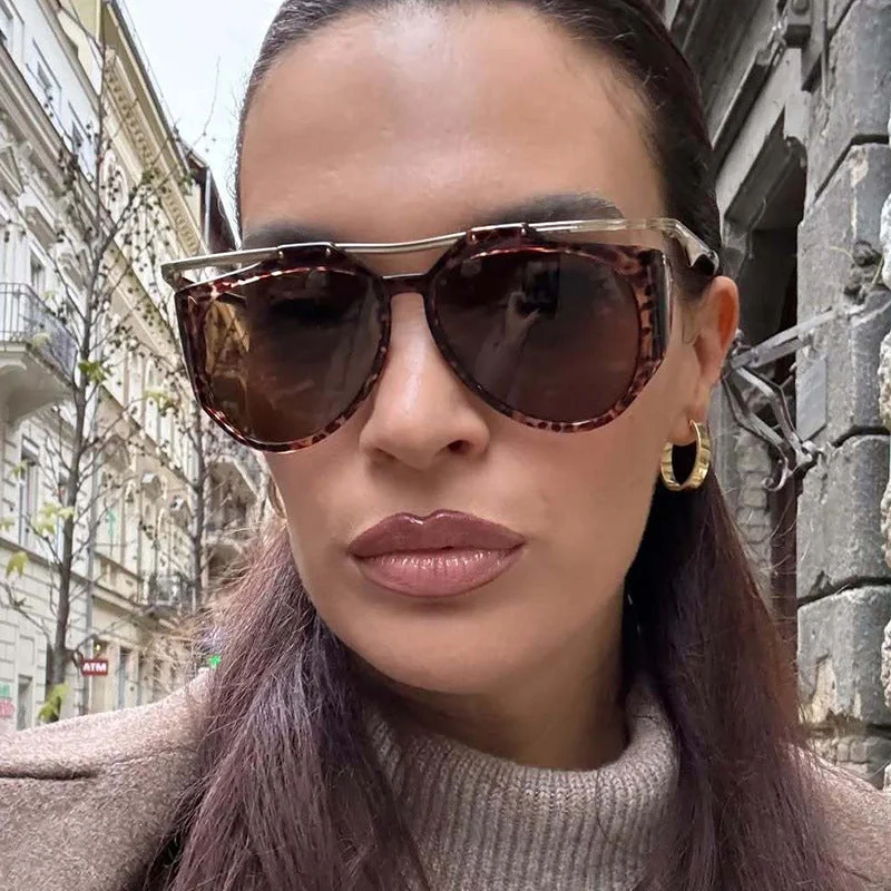 Dame Cat-Eye solbriller med unikt design og beskyttende glass Luvikno