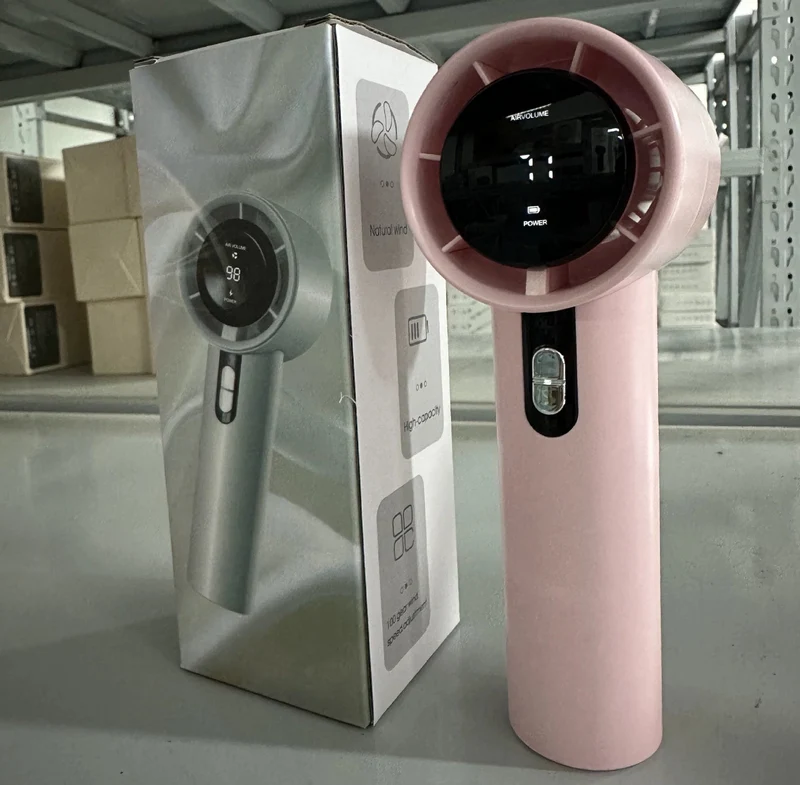 Kvinnelig bærbar håndholdt vifte med smart LED-skjerm Skanto