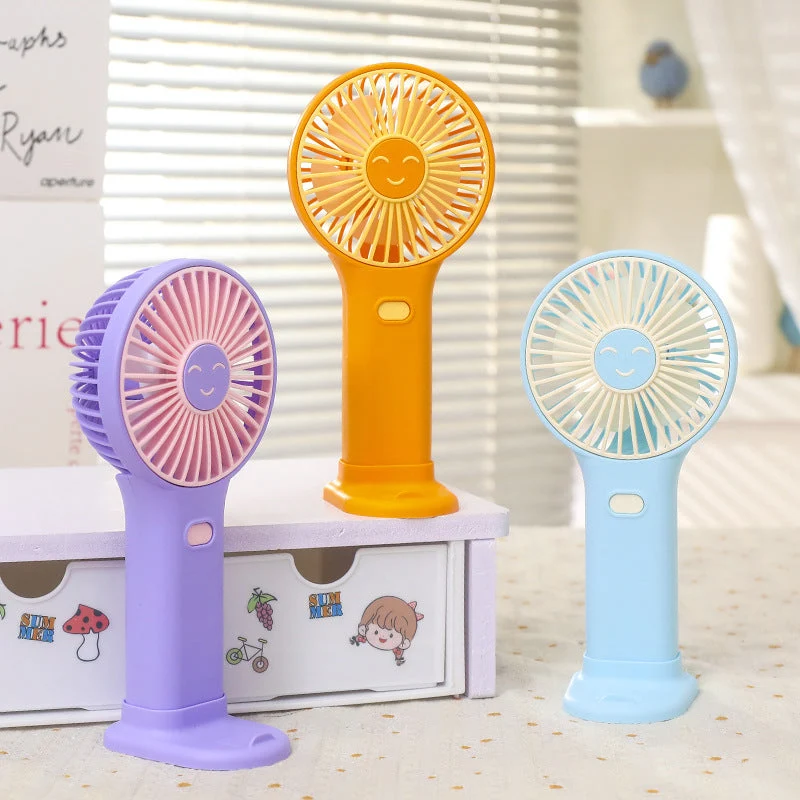 Dames bærbar USB håndvifte med innovativt smilendesign Luvikno