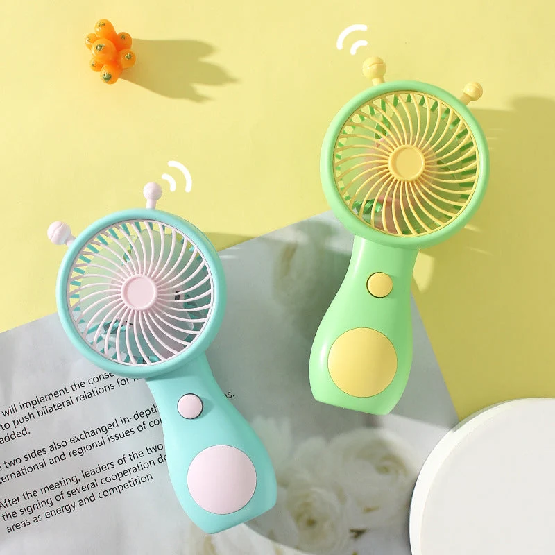 Kvinnelig bærbar håndvifte med ergonomisk design og stille viftetrinn Skanto
