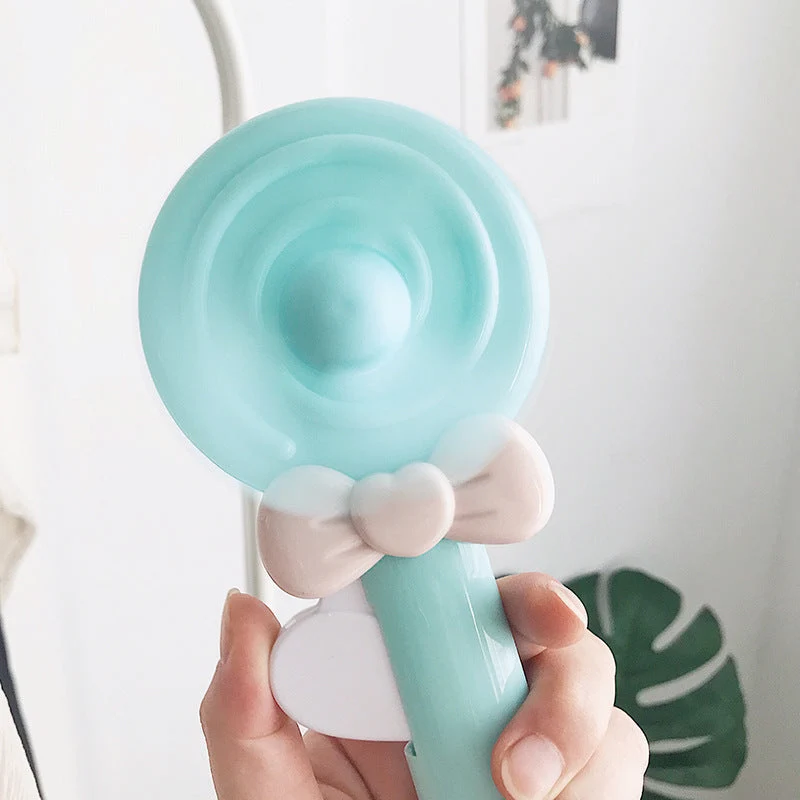Bærbar håndholdt vifte for kvinner i lollipop-design Skanto