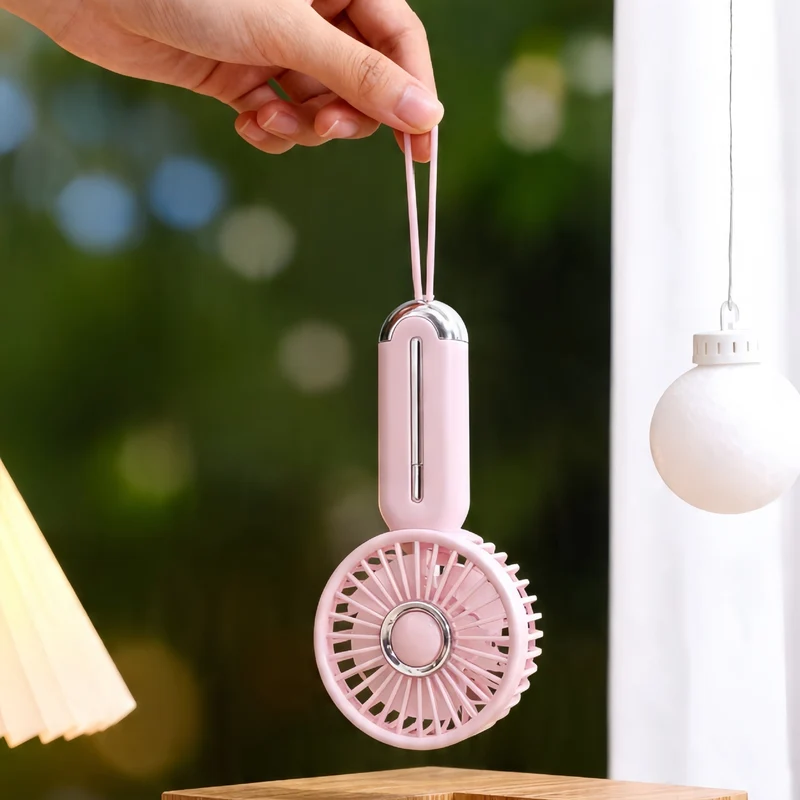 Kvinnelig bærbar håndholdt vifte med USB-ladefunksjon og ergonomisk design Luvikno