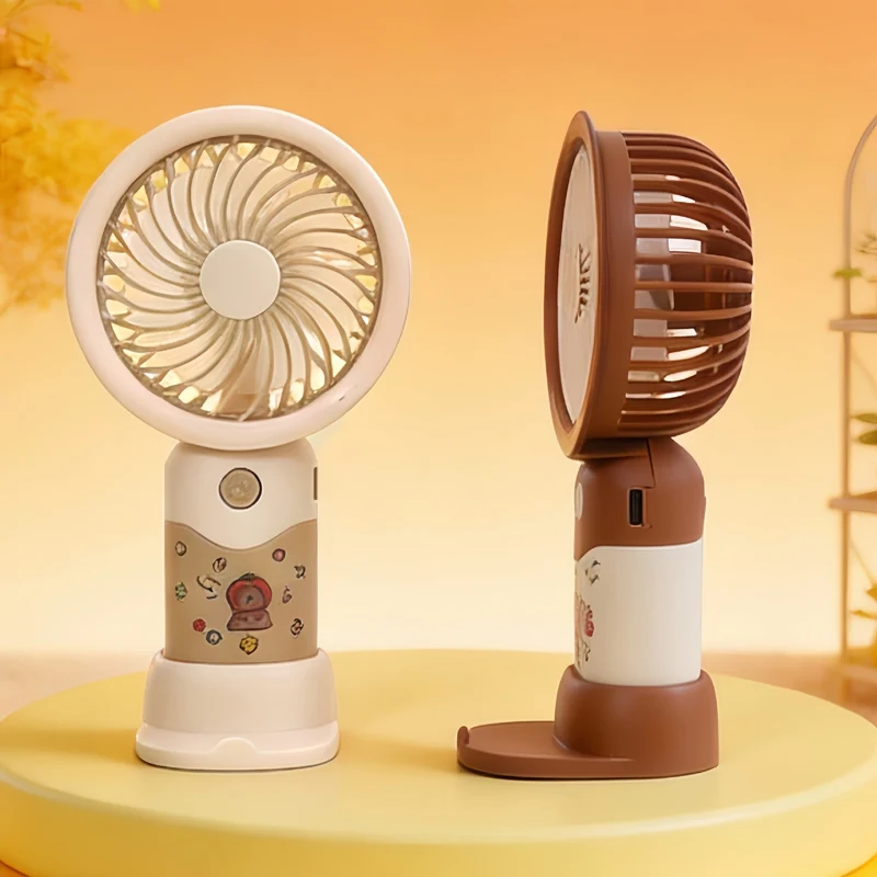 Dame portable håndvifte med ergonomisk design og søtt motiv Luvikno