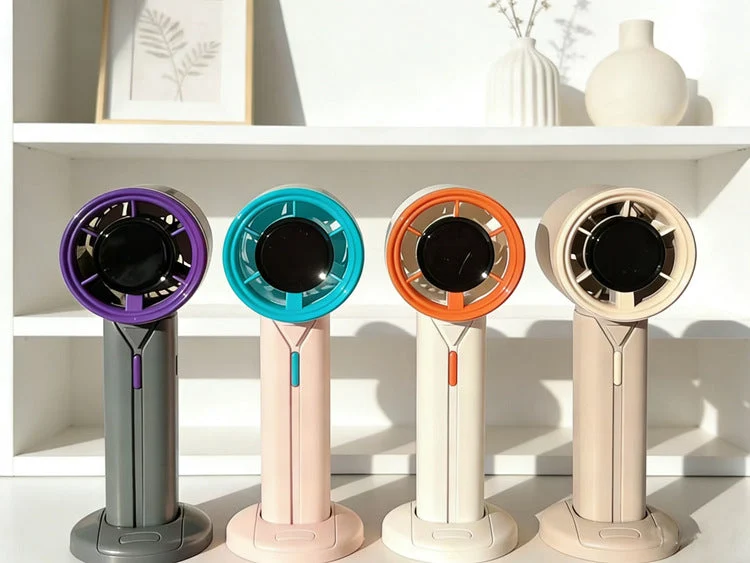 Unisex Bærbar Håndvifte med ergonomisk design og USB-opladning Luvikno