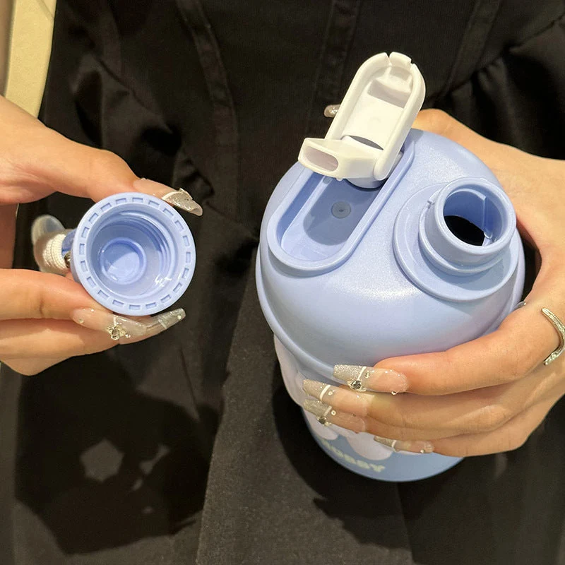 Damen isolierte Wasserflasche mit ergonomischem Tragegriff und fröhlichem Motiv Luvikno