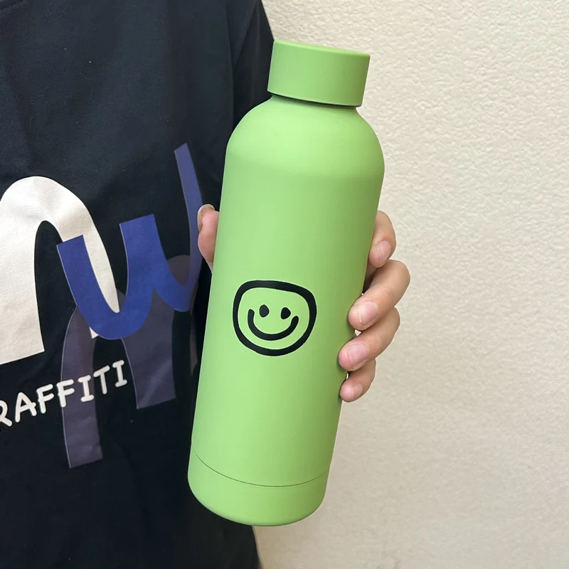 Dame isolasjonsflaske med glad smiley-design Luvikno