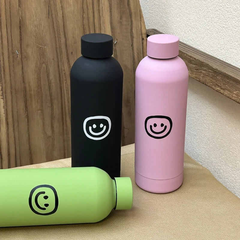 Dame isolasjonsflaske med glad smiley-design Luvikno