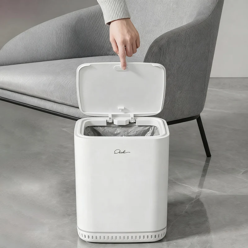 Trash can with lid and automatic bag holder