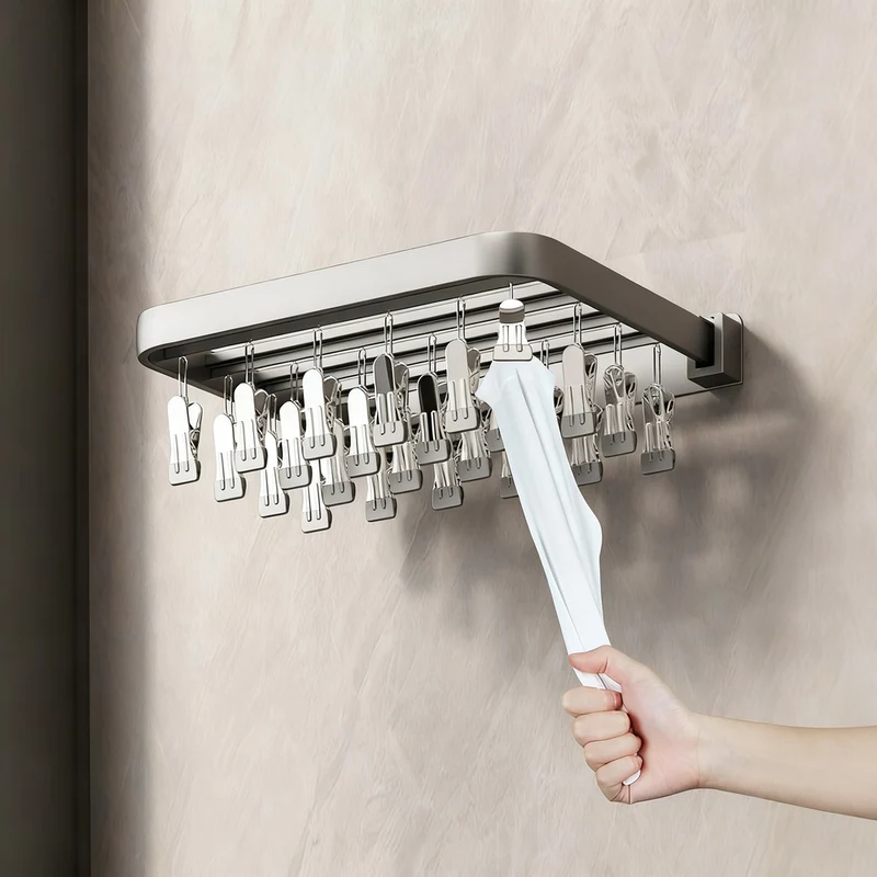 Wall-mounted clothes dryer with clamps