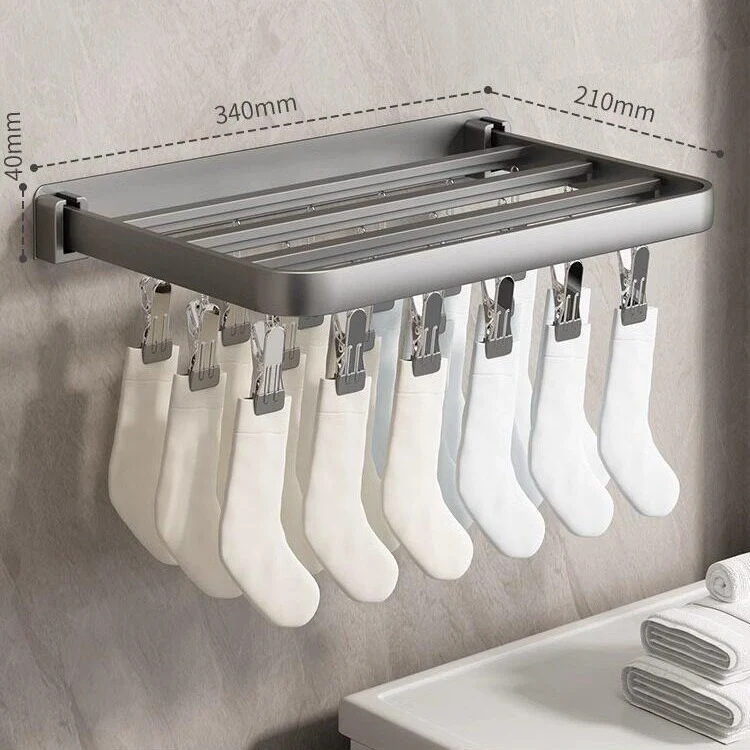 Wall-mounted clothes dryer with clamps