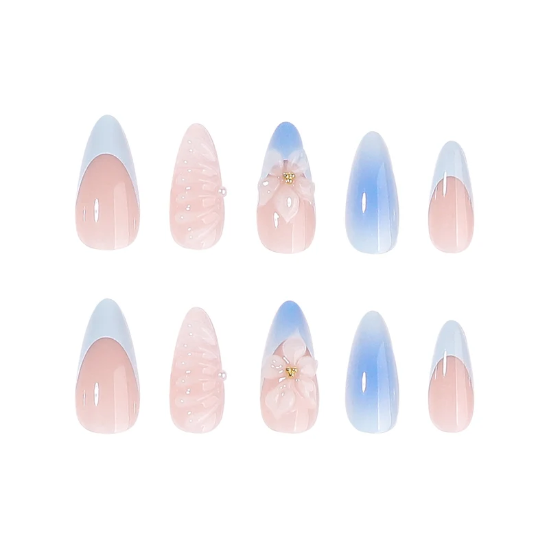 Stiletto-Nägel mit floralem Design und Glitzer Akzenten Karnz