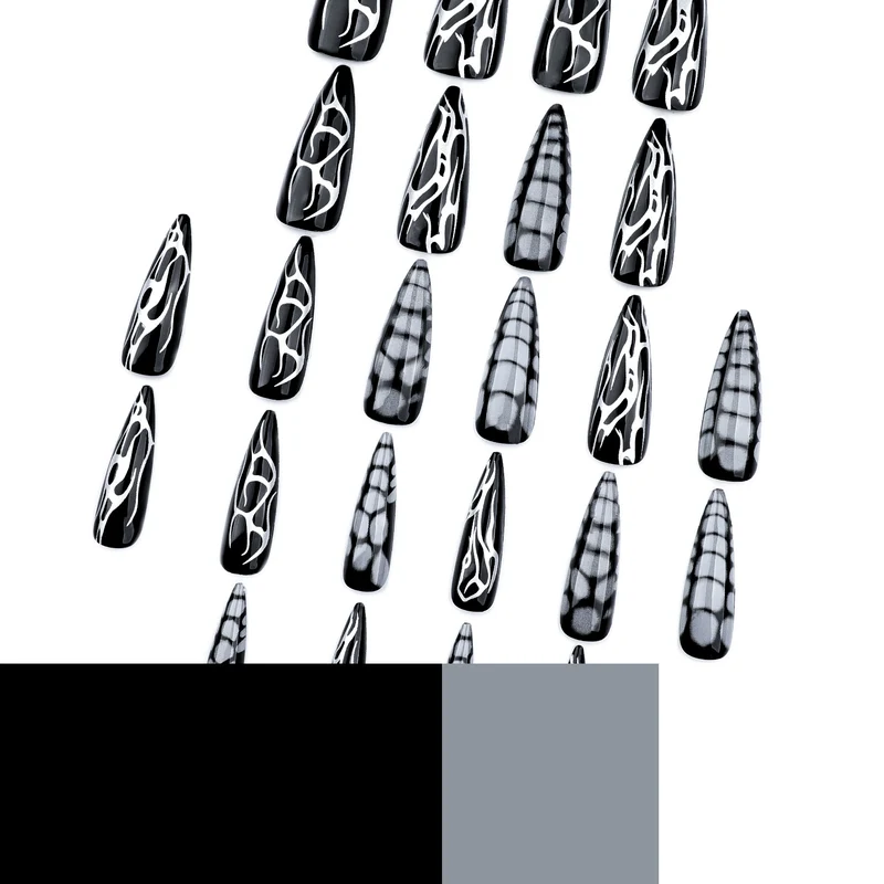 Kunstvolle Stiletto-Nägel mit modernem Strukturen-Design Karnz