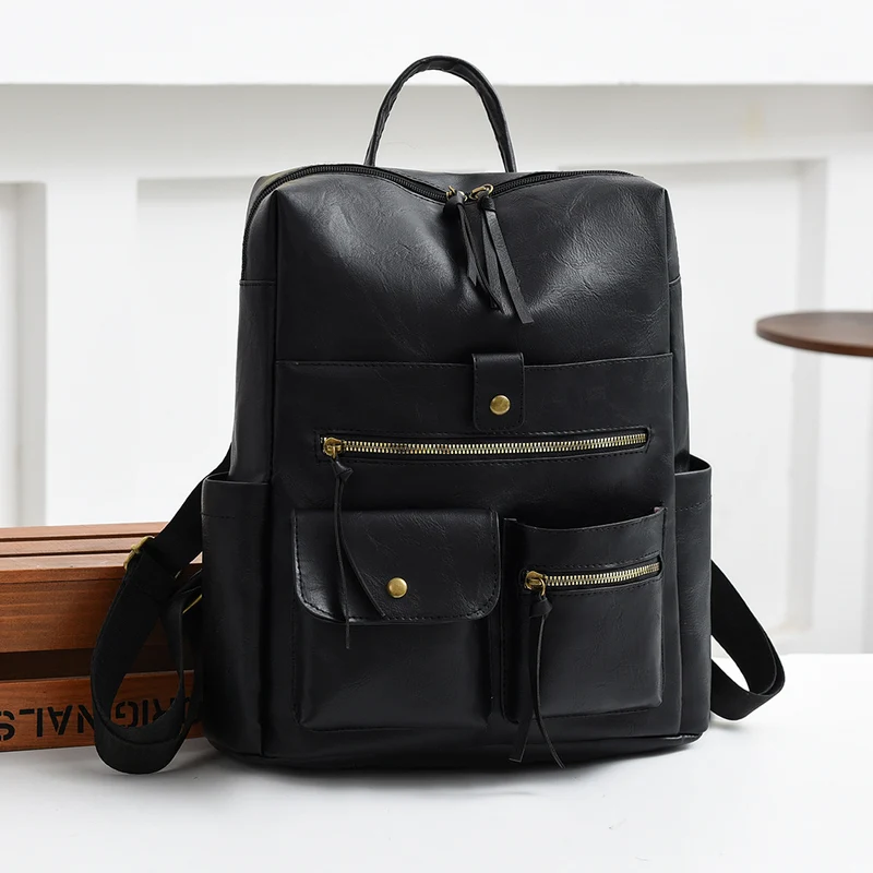 Stylish Multi-Pocket Faux Leather Backpack Stornfield