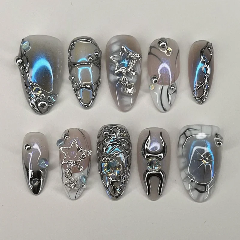 Artful Nail Extensions with Shiny Metal Accents Stornfield