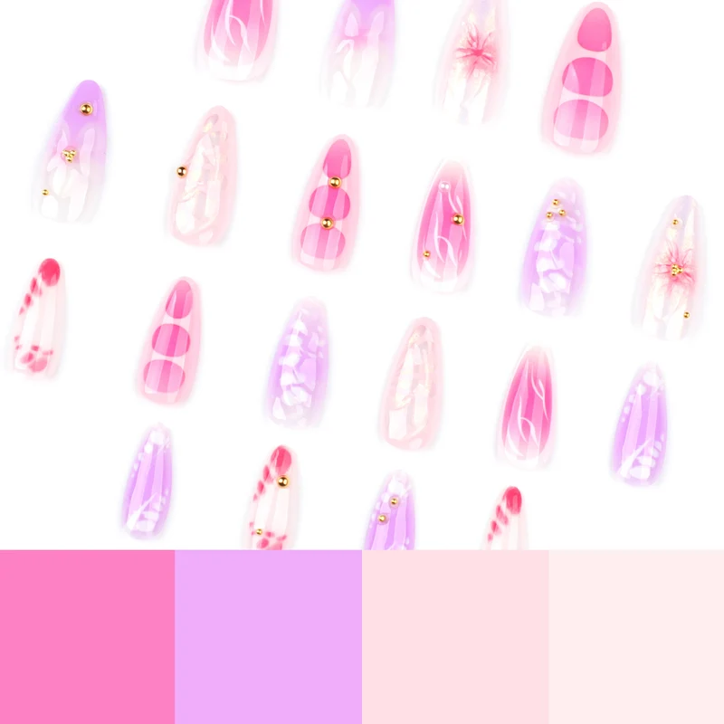 Artful Nail Extensions with Floral Patterns and Rhinestone Embellishments Stornfield