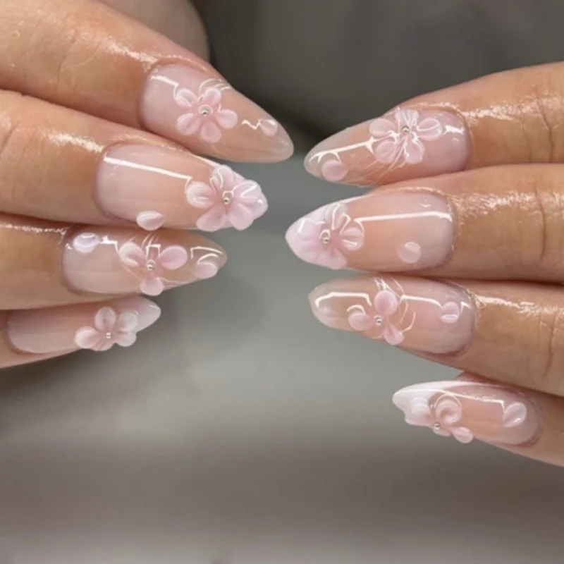 Artful nail extensions with floral 3D details Stornfield