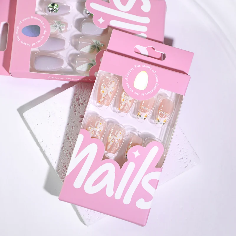 Artful Nail Extensions with Floral Design and Bow Accents Stornfield