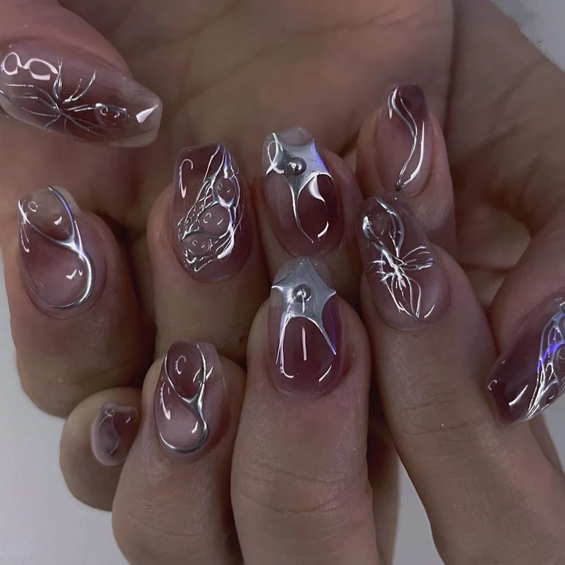Artful Nail Extensions with Filigree Design Stornfield