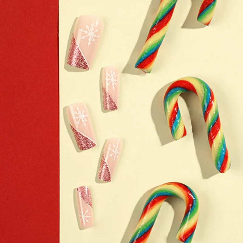 Artful Nail Extensions with Festive Glitter and Snowflake Design Stornfield