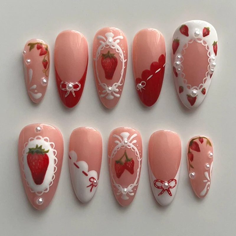 Artful nail extensions with strawberry motifs Stornfield