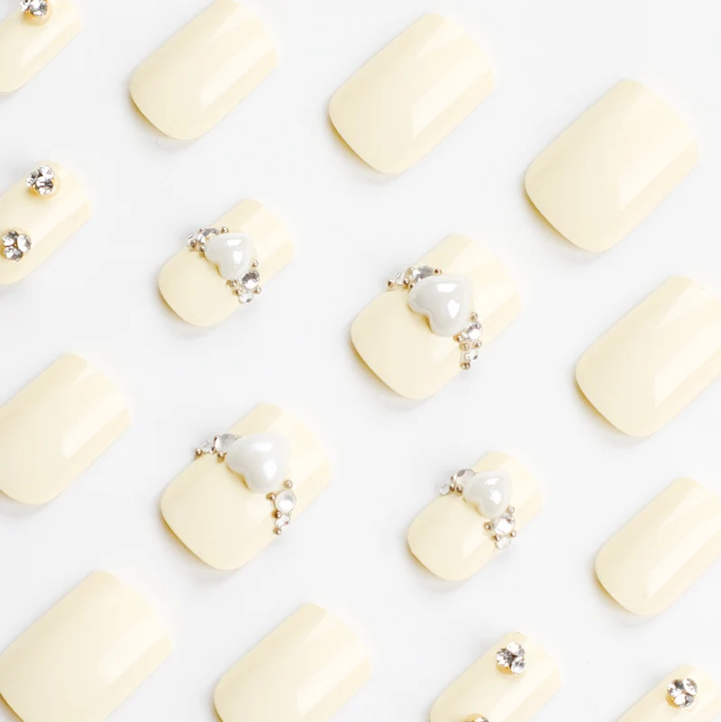 Artistic Nail Extensions with Elegant Decorative Details Stornfield