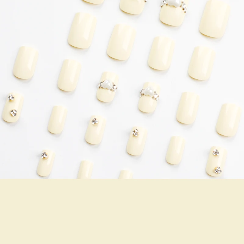 Artistic Nail Extensions with Elegant Decorative Details Stornfield