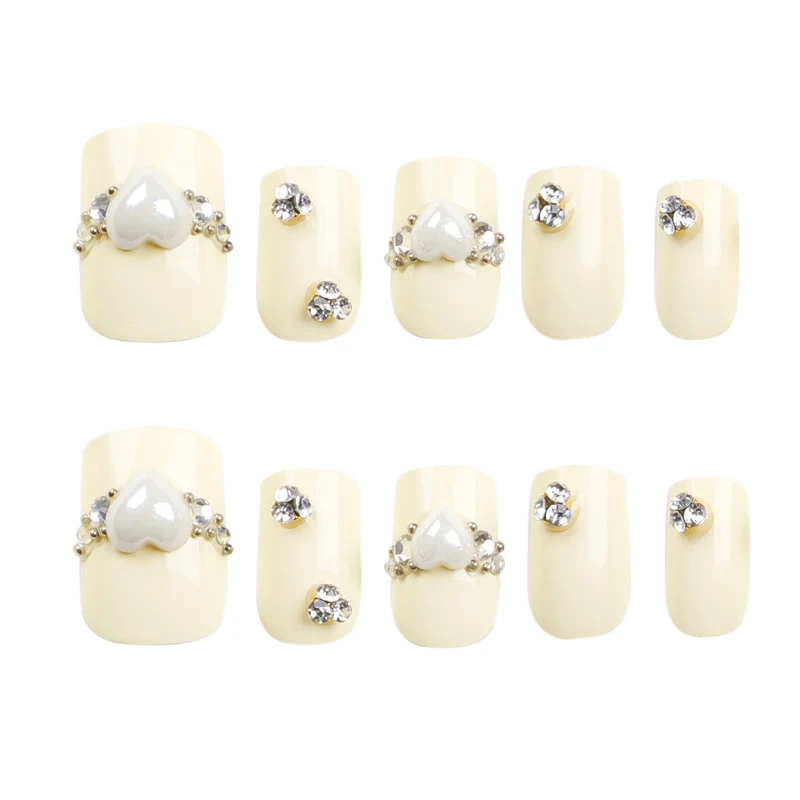 Artistic Nail Extensions with Elegant Decorative Details Stornfield