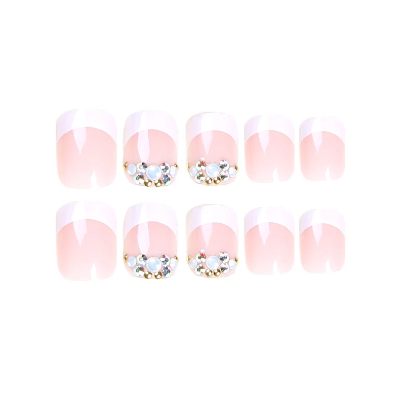 Artful Nail Extensions with Elegant Jewelry Accents Stornfield