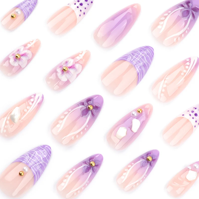 Artful nail extensions with elegant floral embellishments Stornfield