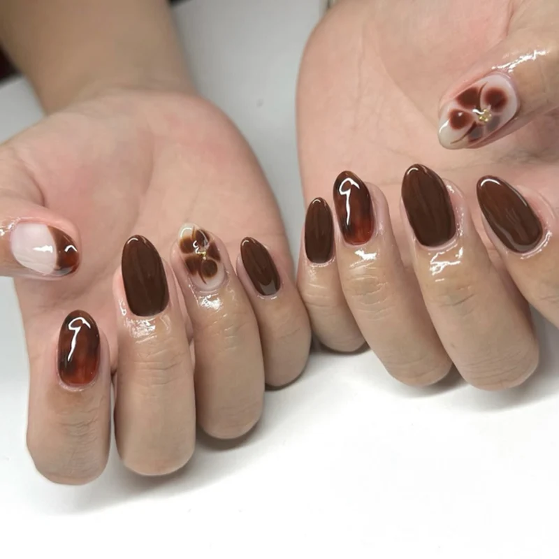 Artful Nail Extensions with Elegant Floral and Glossy Design Stornfield