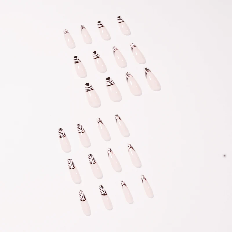 Artful Nail Extensions with Elegant Black-White Pattern Stornfield