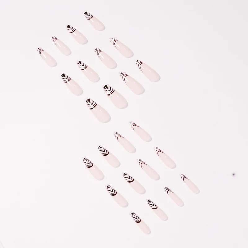 Artful Nail Extensions with Elegant Black-White Pattern Stornfield