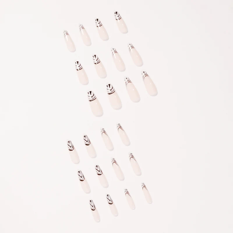 Artful Nail Extensions with Elegant Black-White Pattern Stornfield