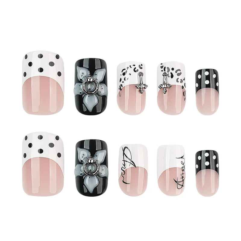 Artful nail extensions with elegant black-and-white design Stornfield