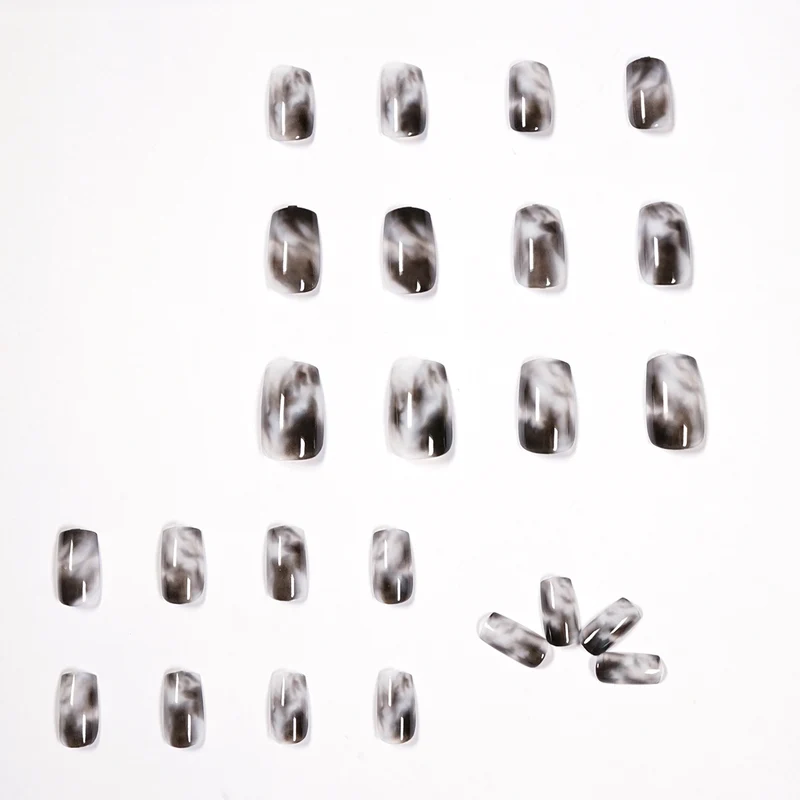 Artful Nail Extensions with Elegant Marble Design Stornfield