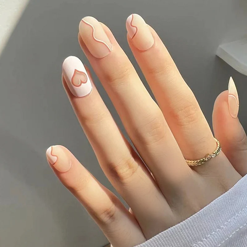 Artful Nail Extensions with Elegant Heart Design Stornfield
