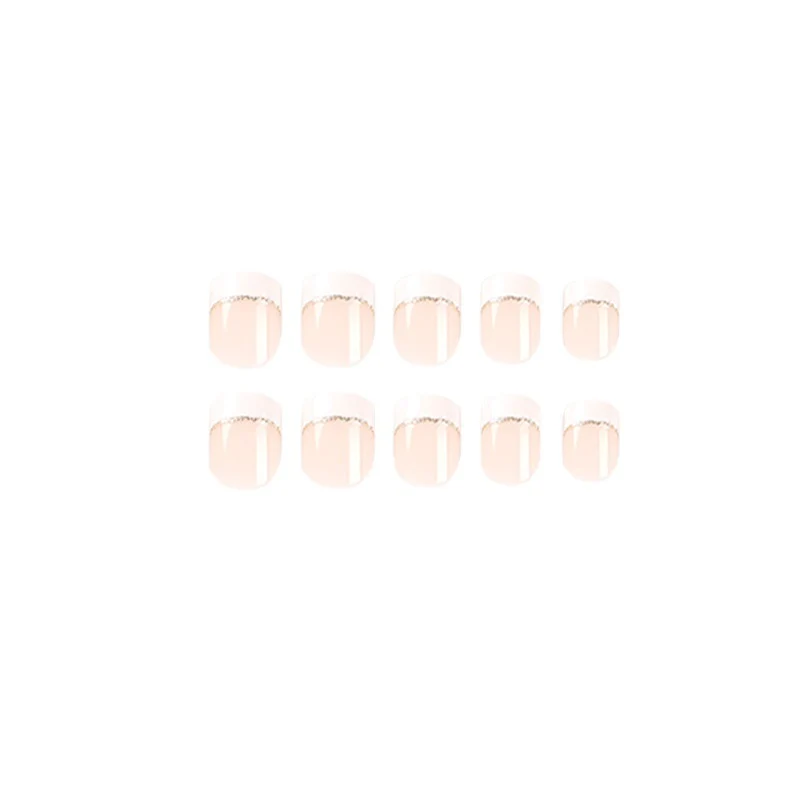 Artful nail extensions with elegant French tip and gold accents Stornfield
