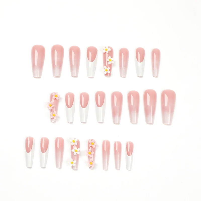 Artful nail extensions with elegant gradient and creative floral accents Stornfield