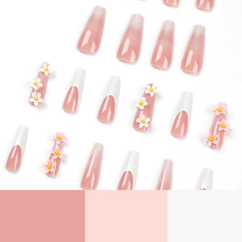 Artful nail extensions with elegant gradient and creative floral accents Stornfield