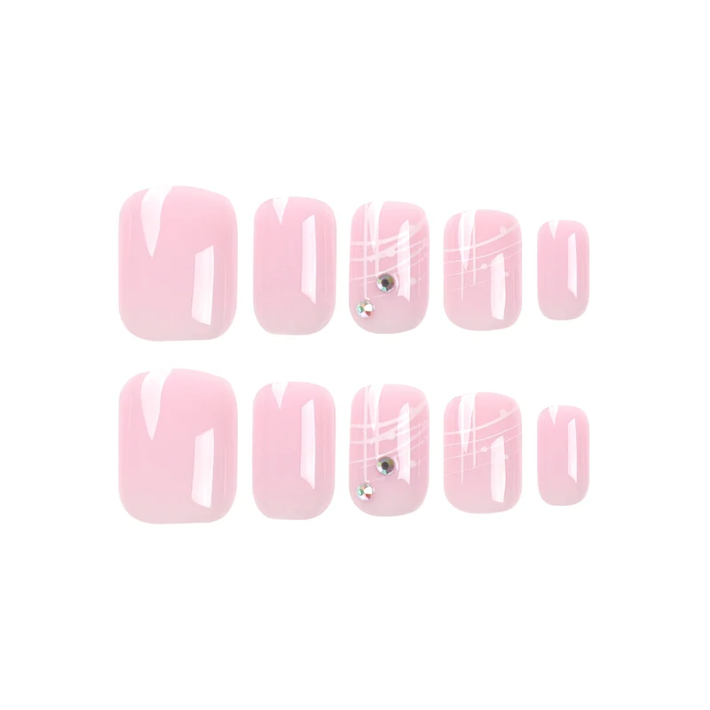 Artful nail extensions with elegant design and rhinestone embellishments Stornfield
