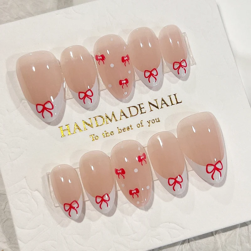 Artful nail extensions with an elegant leaf pattern Stornfield