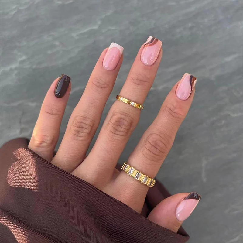 Artful nail extensions with an elegant leaf pattern Stornfield