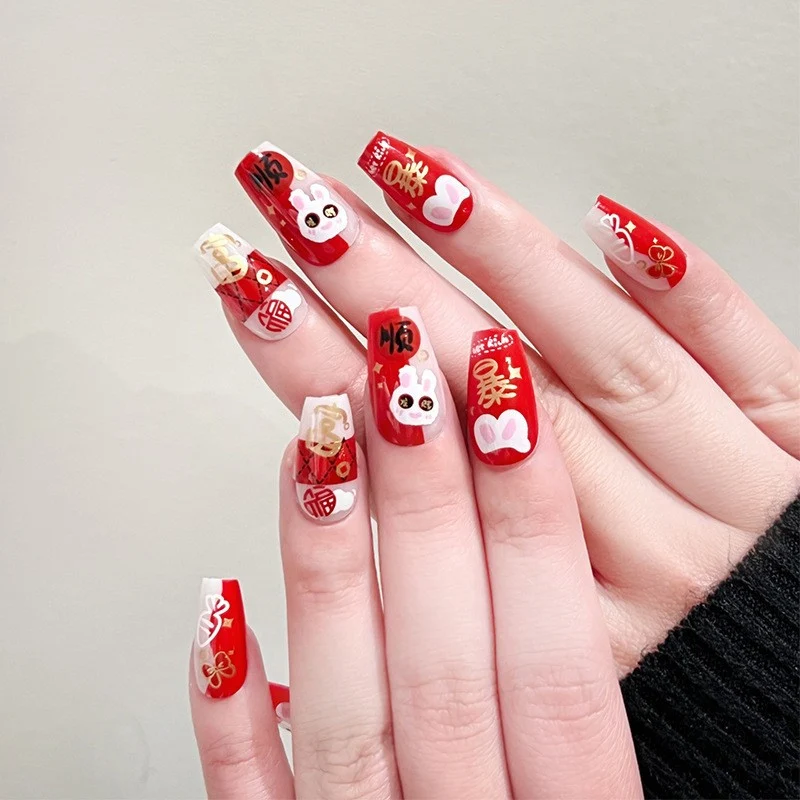Artful nail extensions with an elegant leaf pattern Stornfield