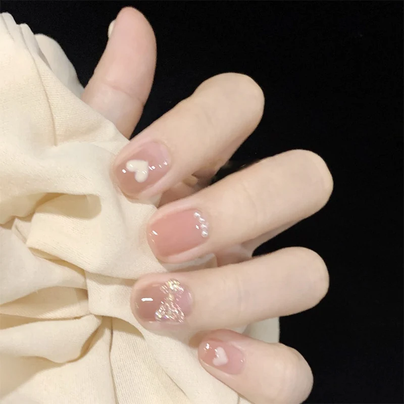 Artful nail extensions with an elegant leaf pattern Stornfield