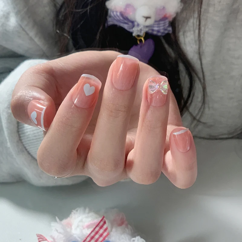 Artful nail extensions with an elegant leaf pattern Stornfield