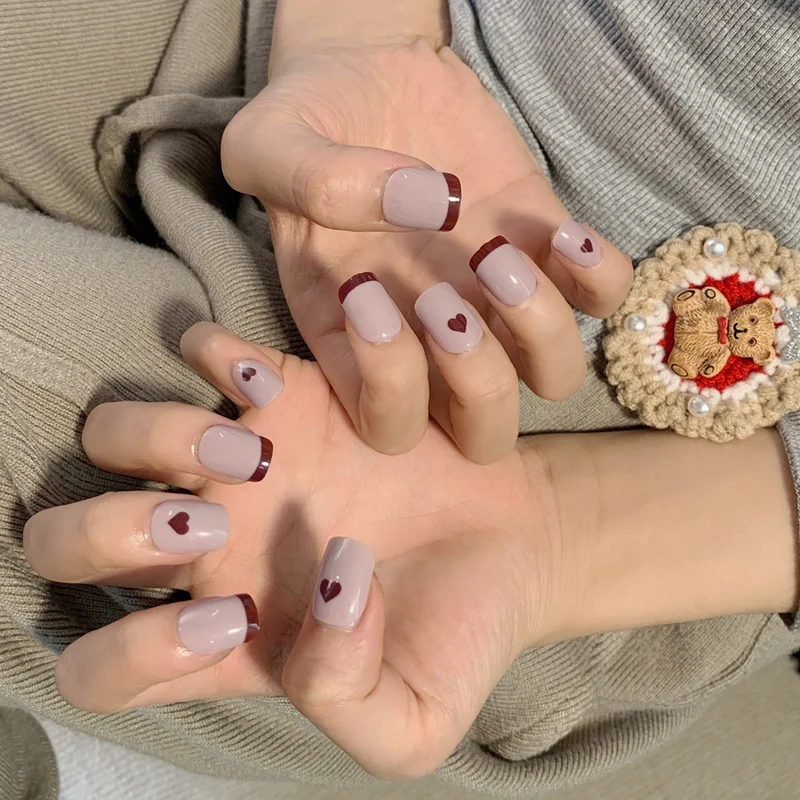 Artful nail extensions with an elegant leaf pattern Stornfield