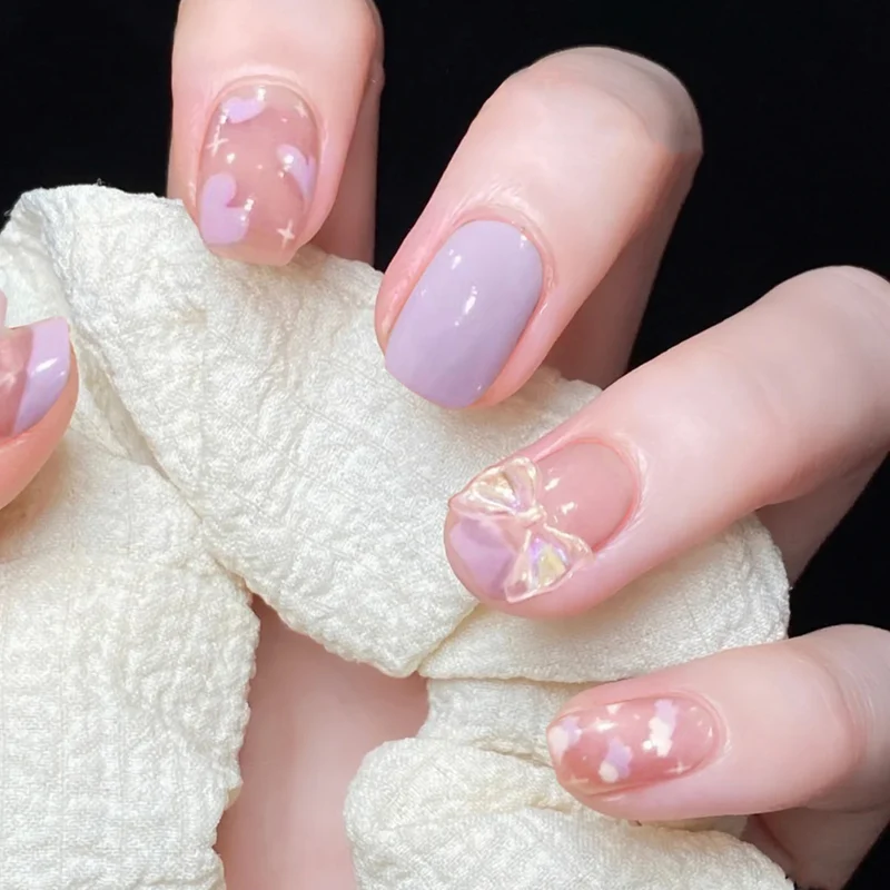 Artful nail extensions with an elegant leaf pattern Stornfield