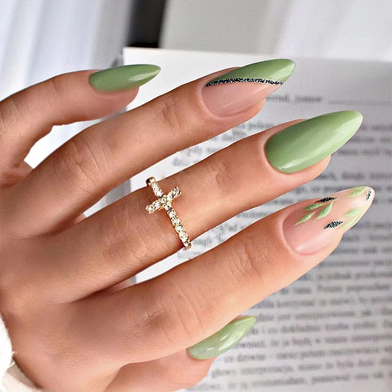Artful nail extensions with an elegant leaf pattern Stornfield