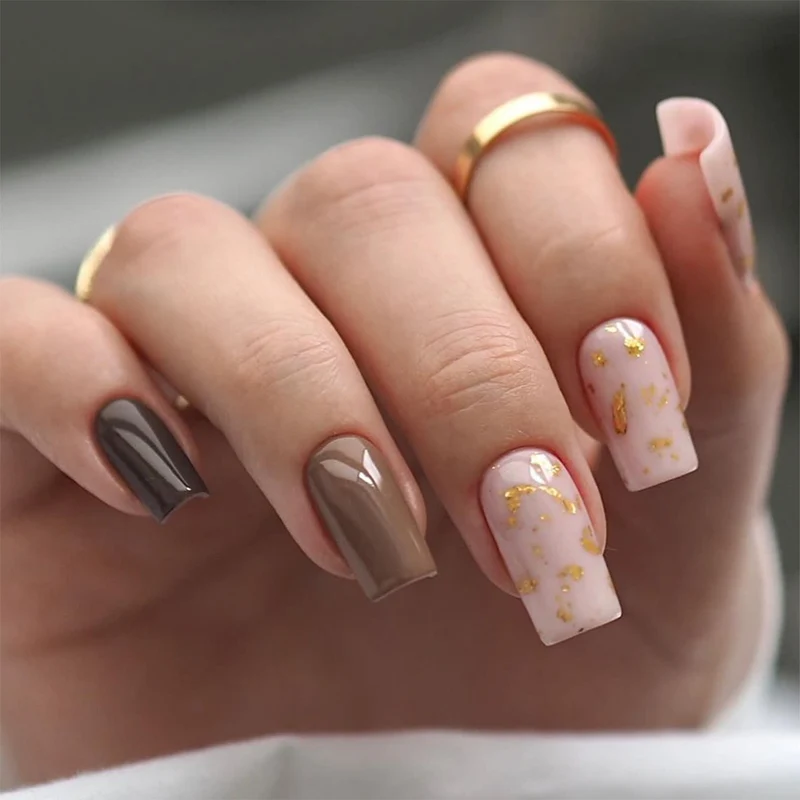 Artful nail extensions with an elegant leaf pattern Stornfield